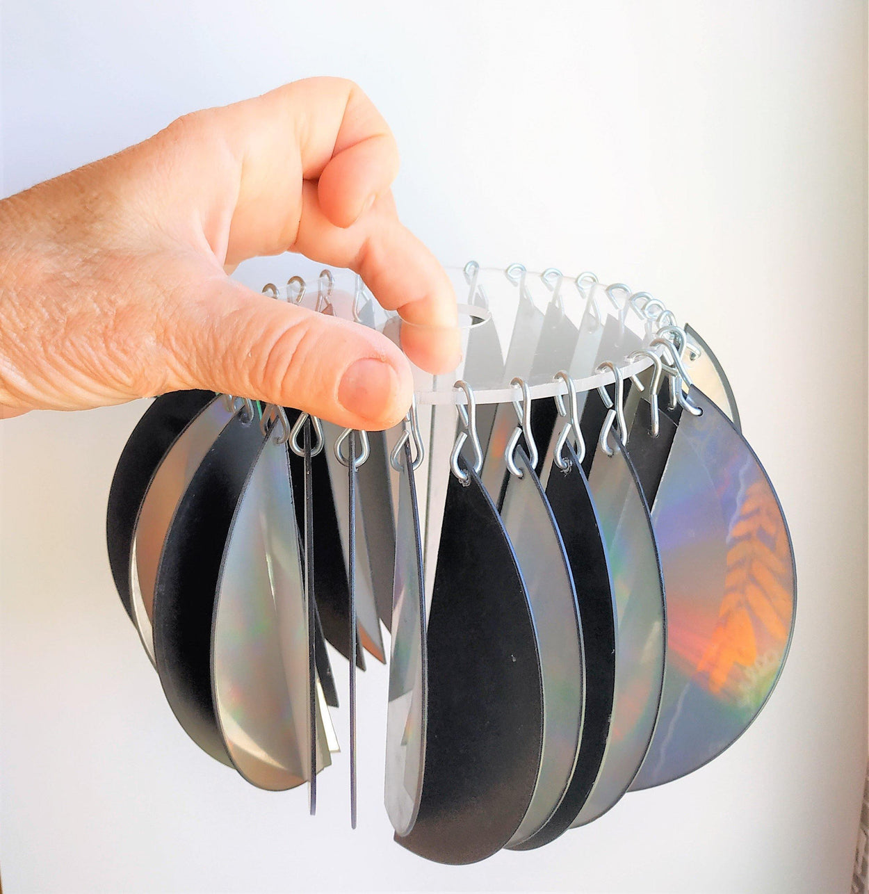Lampshade from computer discs and a similar ceiling suspension lamp - GLEZANT designer goods store.