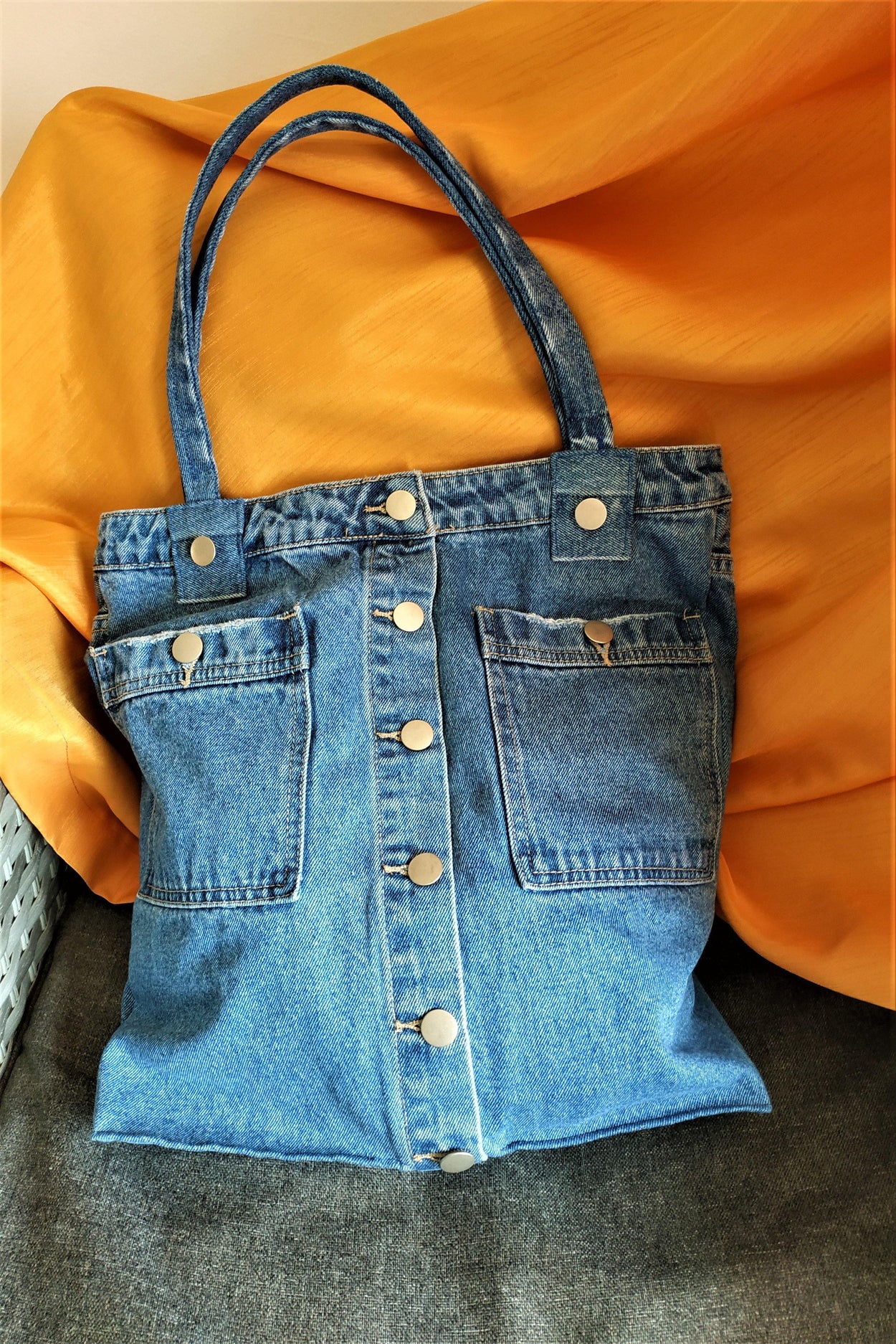 Denim tote bag with two outer and two inner pockets - GLEZANT designer goods store.