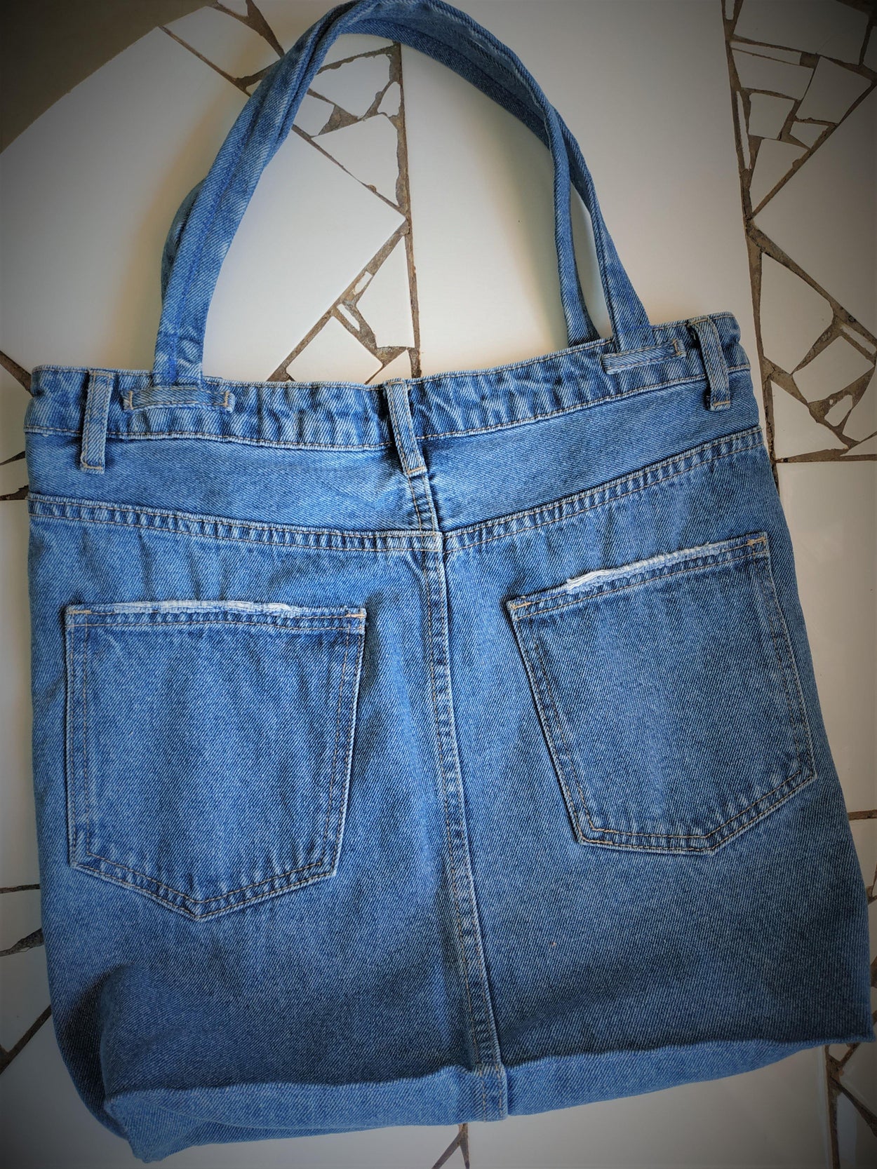 Denim tote bag with two outer and two inner pockets - GLEZANT designer goods store.