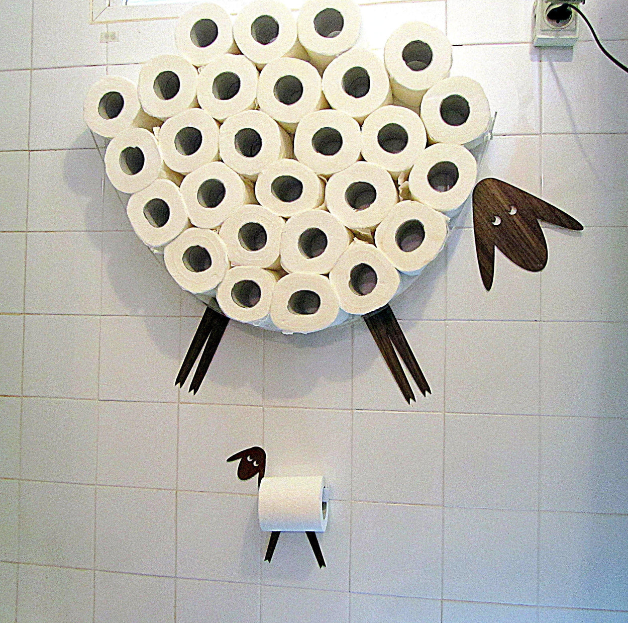 Shelf-Sheep for storing of toilet paper rolls with a roll holder-lamb - GLEZANT designer goods store.