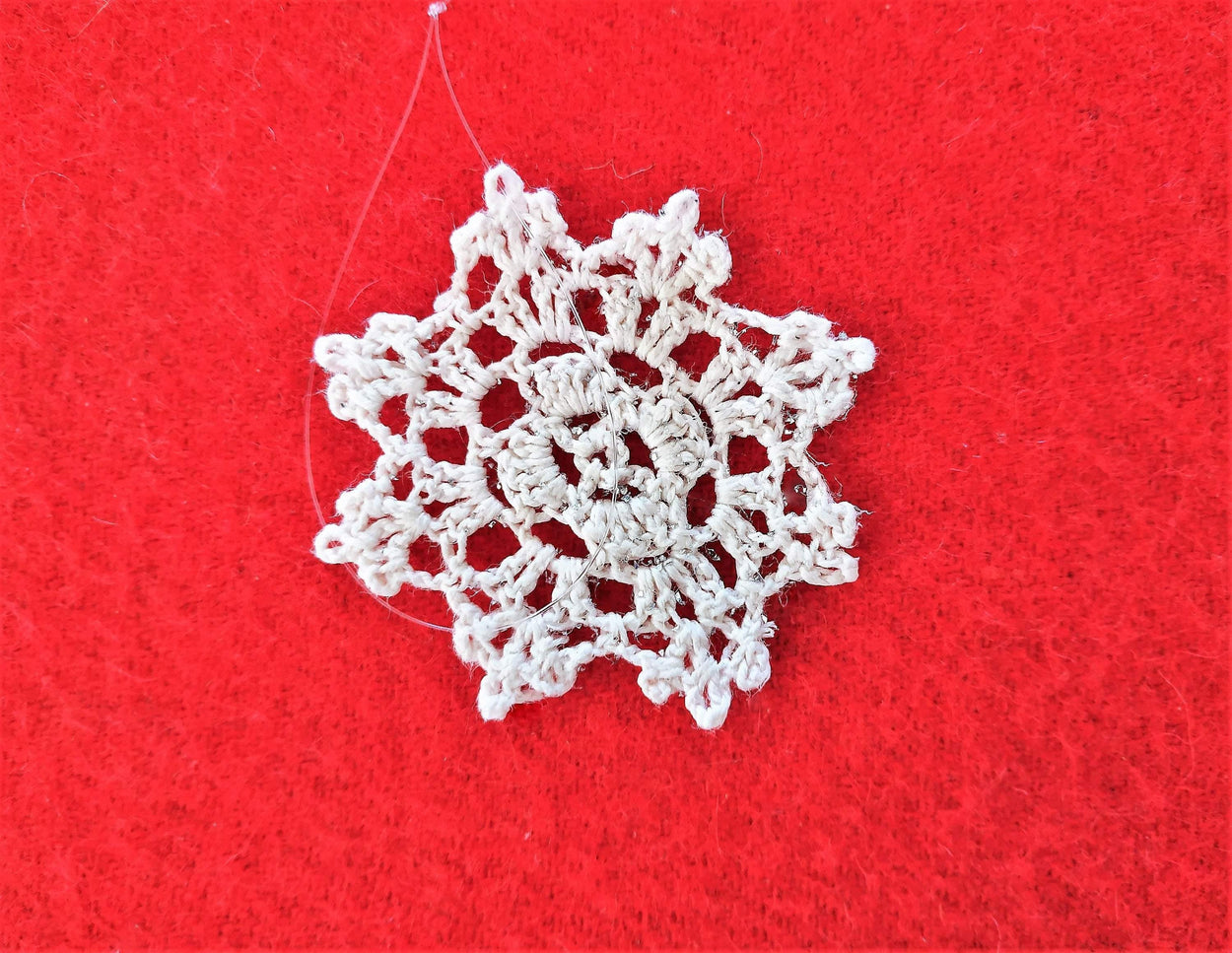 Set of 8 knitted snowflakes for Christmas Tree of as a decorations of the house - GLEZANT designer goods store.
