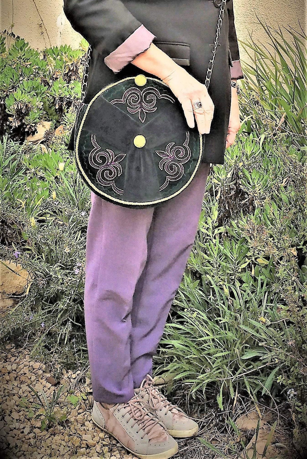 Exclusive dark green round ethno style bag with a long handle - GLEZANT designer goods store.