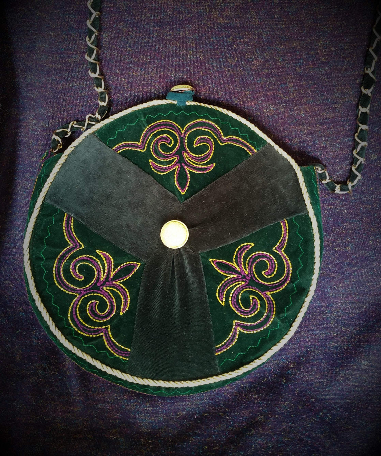 Exclusive dark green round ethno style bag with a long handle - GLEZANT designer goods store.