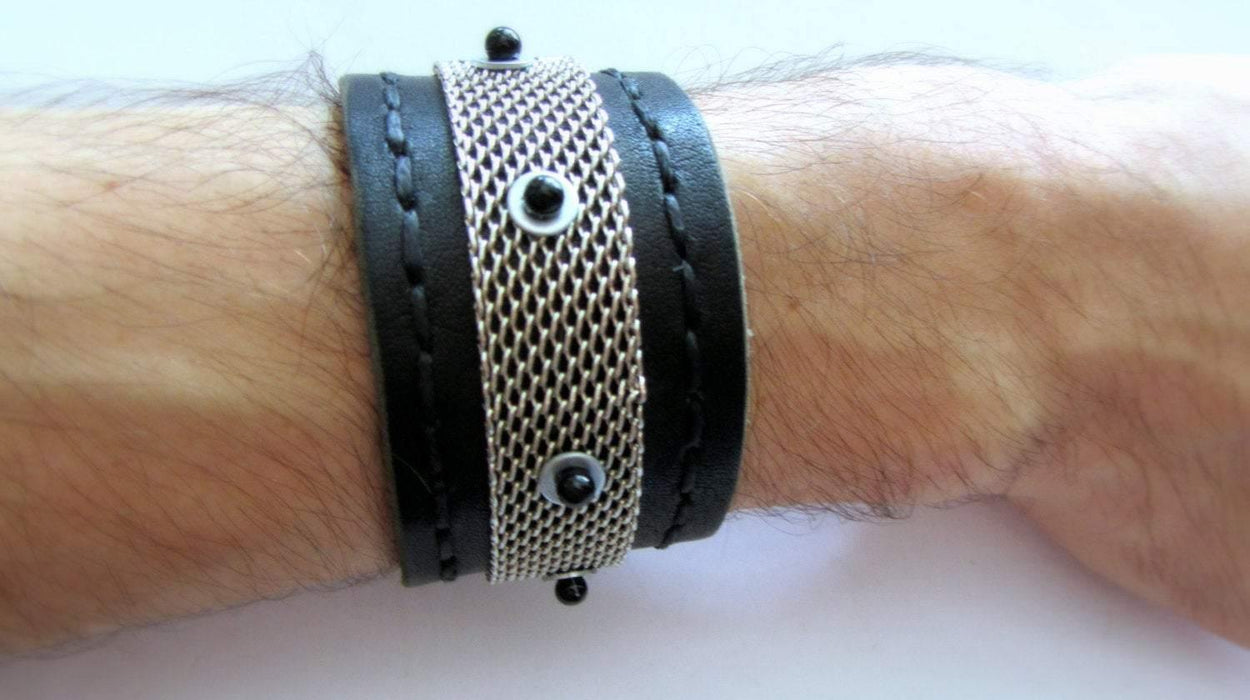 Black leather bracelet decorated with chainmail and white metallic disc with black stone beads on them. Closure - strap with velcro. - GLEZANT designer goods store.