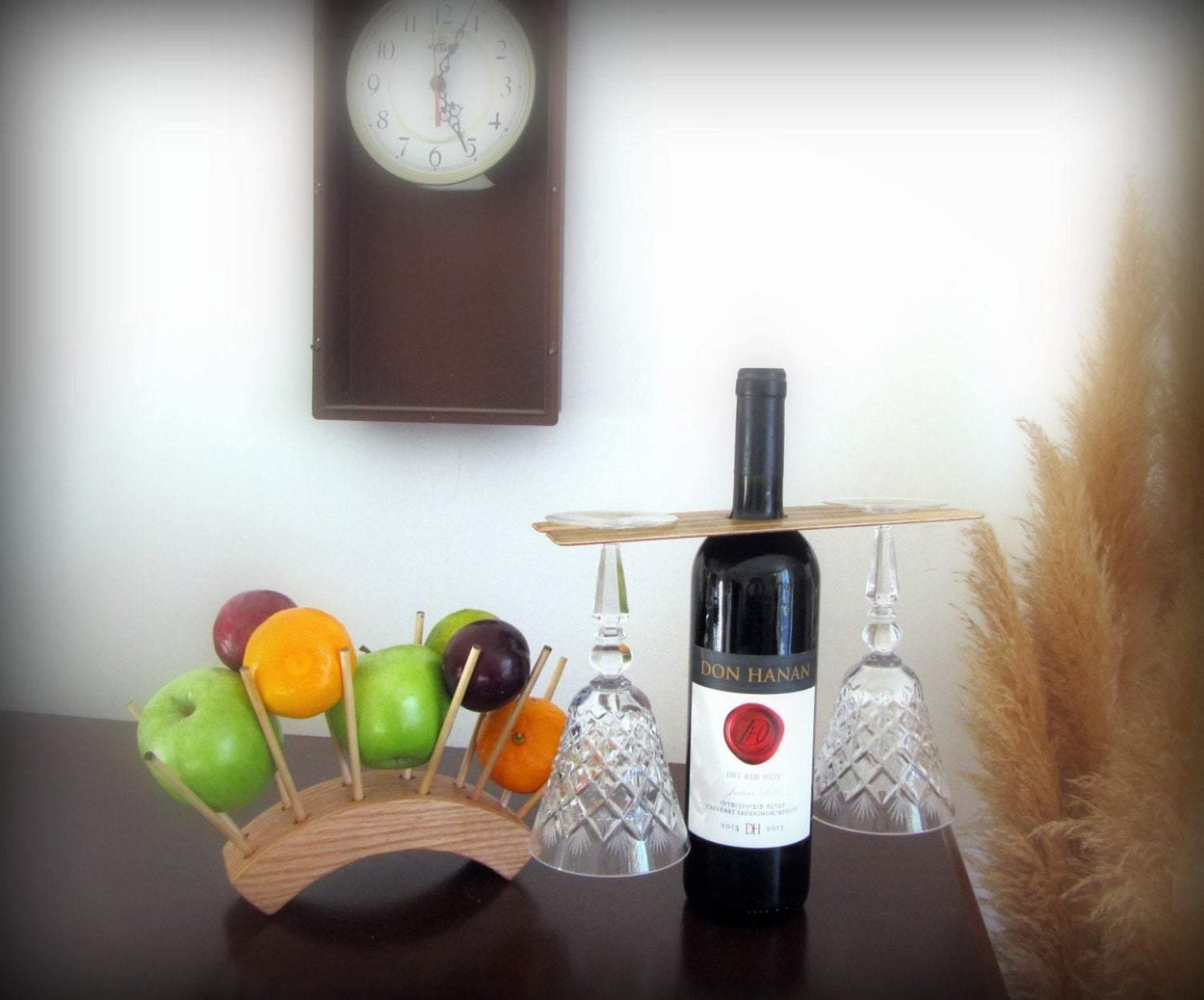 Unique wooden fruit holder where each fruit hangs in the air - GLEZANT designer goods store.
