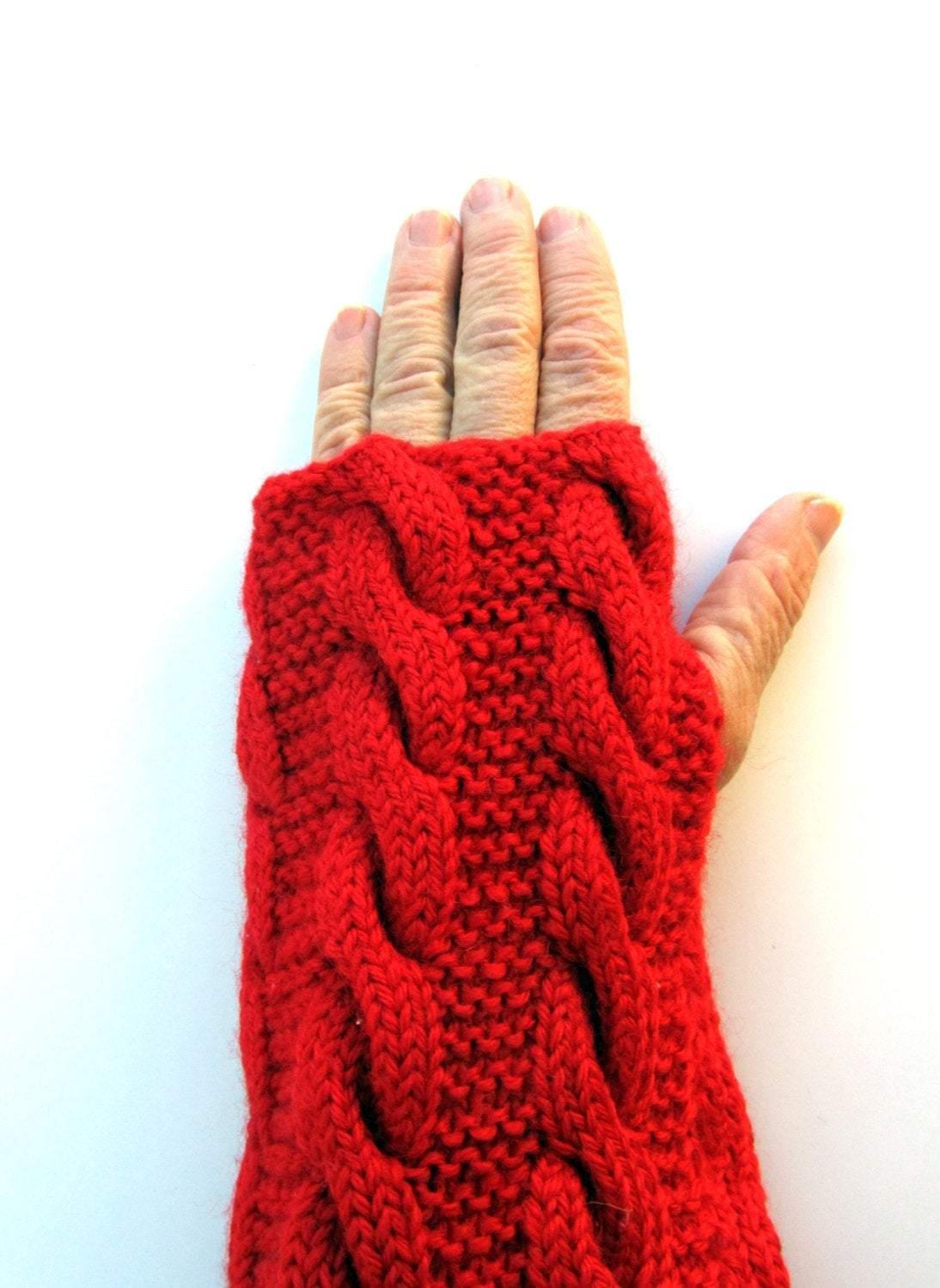 Knitted red set: a pom-pom cap and fingerless gloves/gaiters - GLEZANT designer goods store.