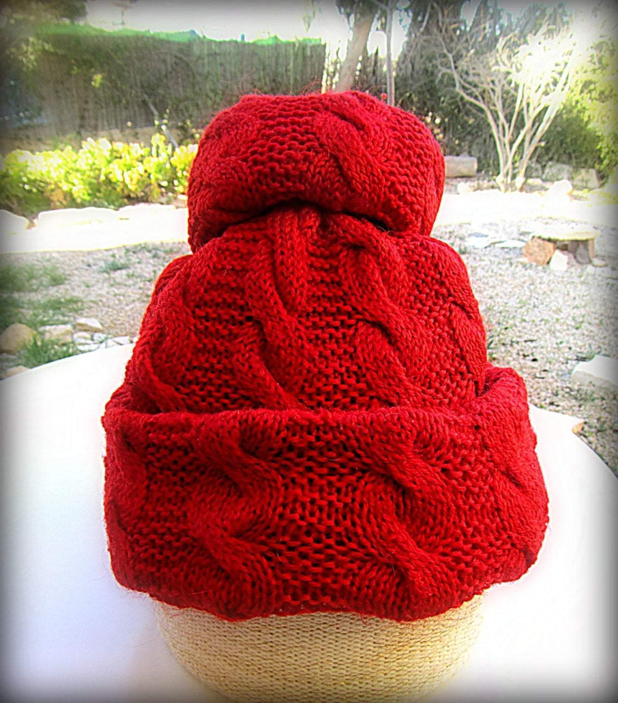 Knitted red set: a pom-pom cap and fingerless gloves/gaiters - GLEZANT designer goods store.