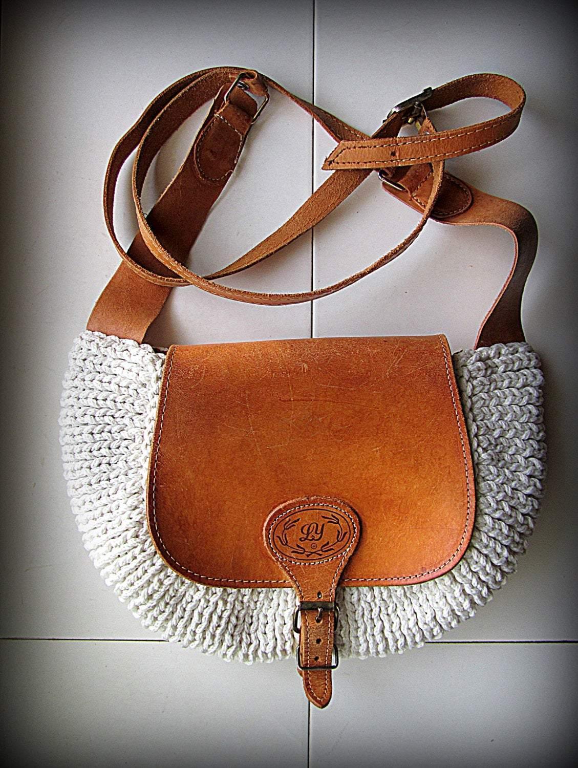 Crossbody / Shoulder bag made out of thick leather with a knitted fragment on a long leather strap - GLEZANT designer goods store.