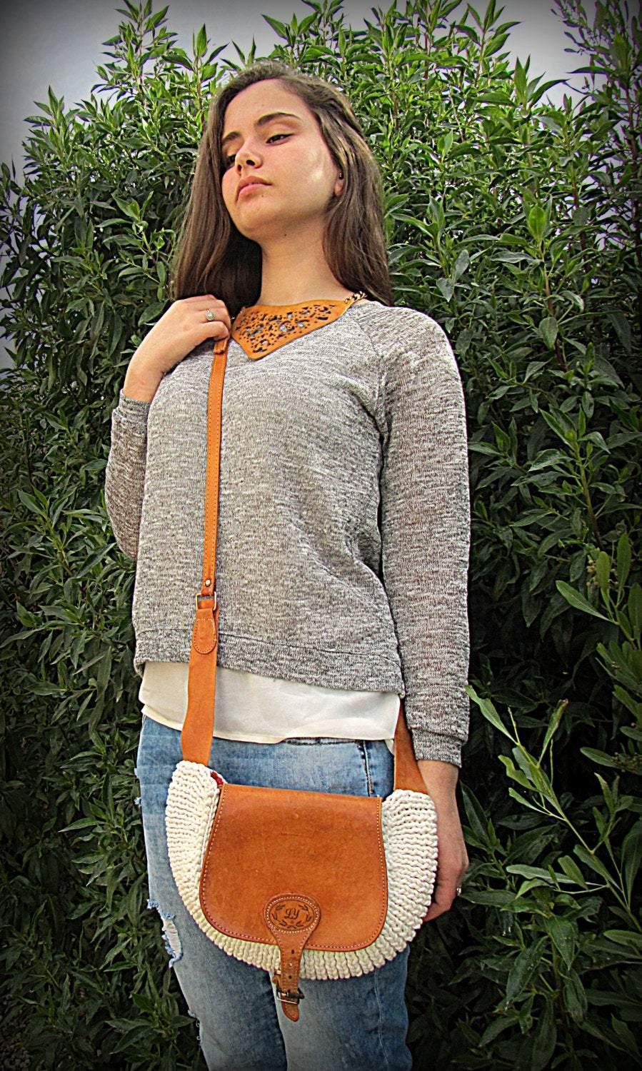Crossbody / Shoulder bag made out of thick leather with a knitted fragment on a long leather strap - GLEZANT designer goods store.
