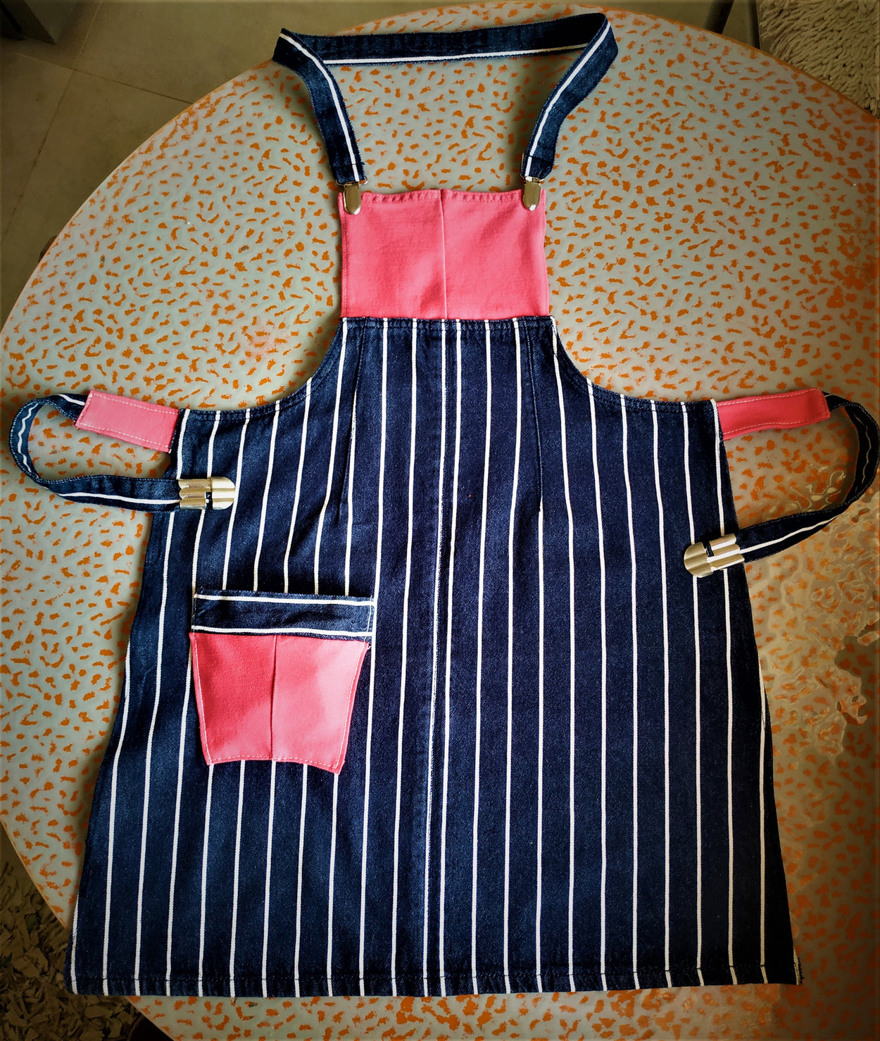 A set of denim aprons for HER and HIM.