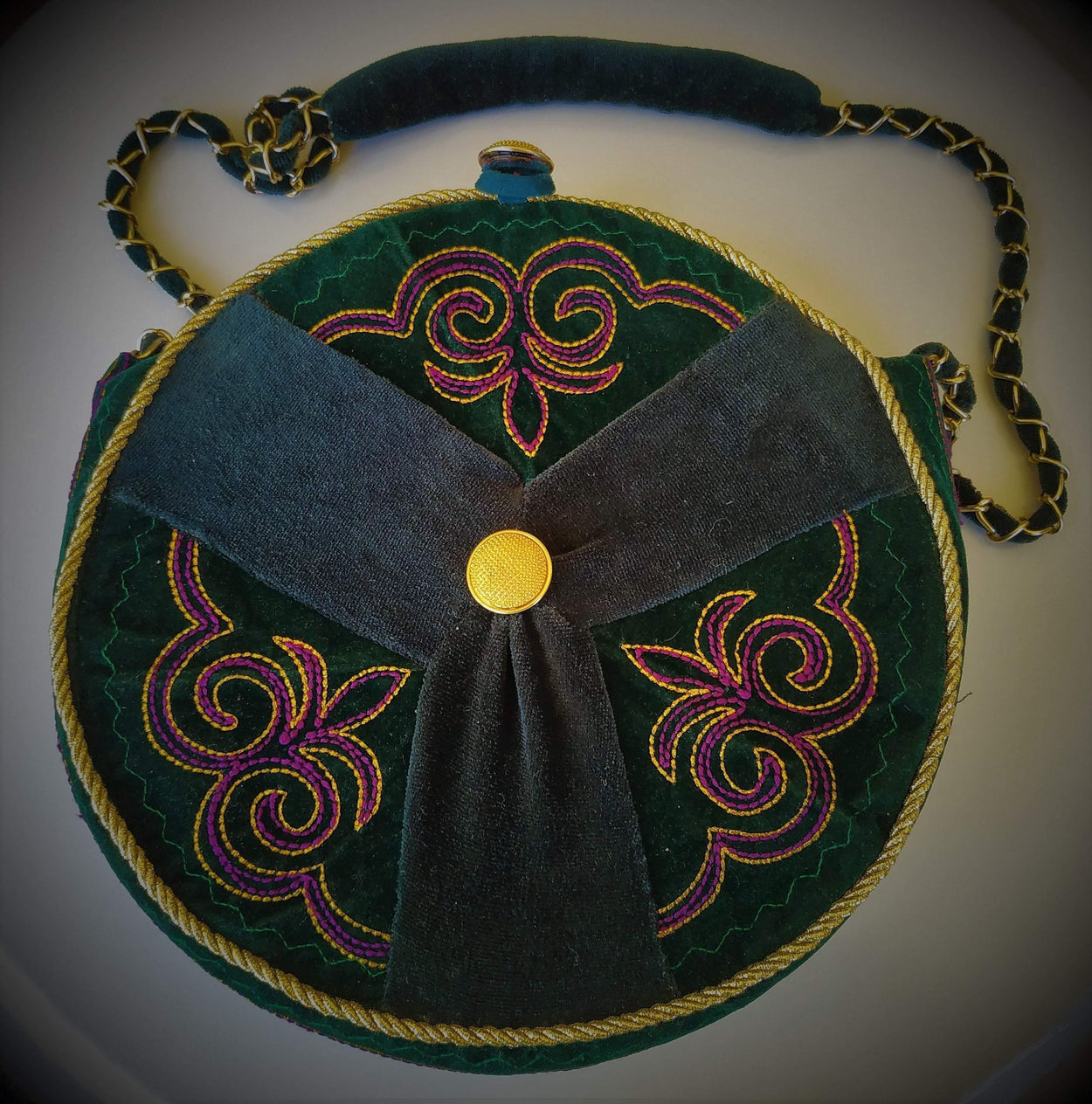 Exclusive dark green round ethno style bag with a long handle - GLEZANT designer goods store. 